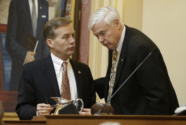 Steve Helber/AP -  House Speaker William Howell (R-Stafford), right, talks with House Appropriations Committee chairman, Del. Chris Jones (R-Suffolk) at the Capitol in Richmond on Wednesday.